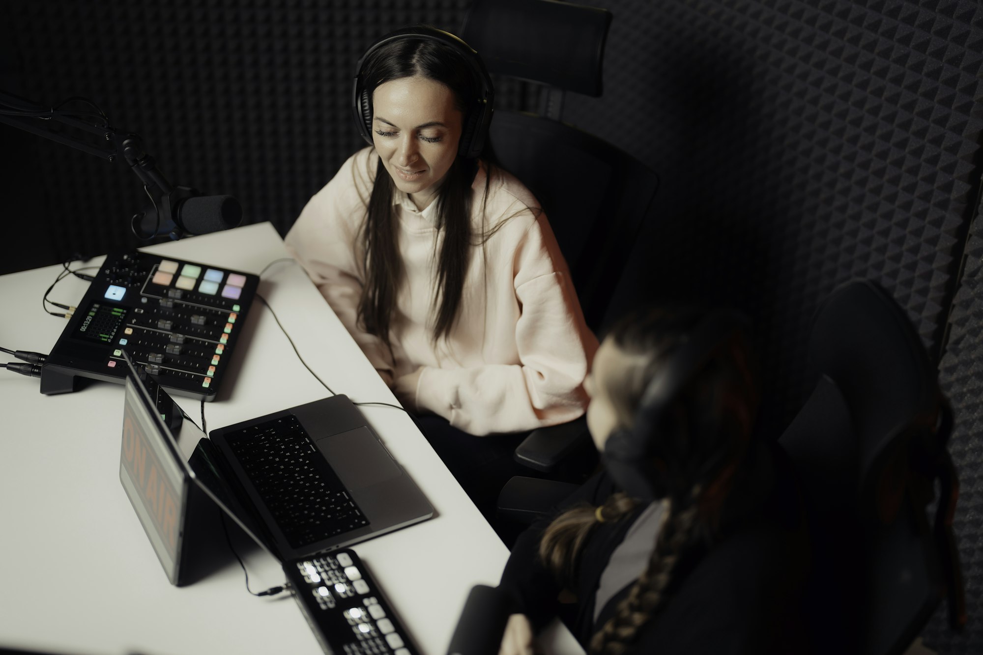 Podcast Production in Action: Female Host at the Controls